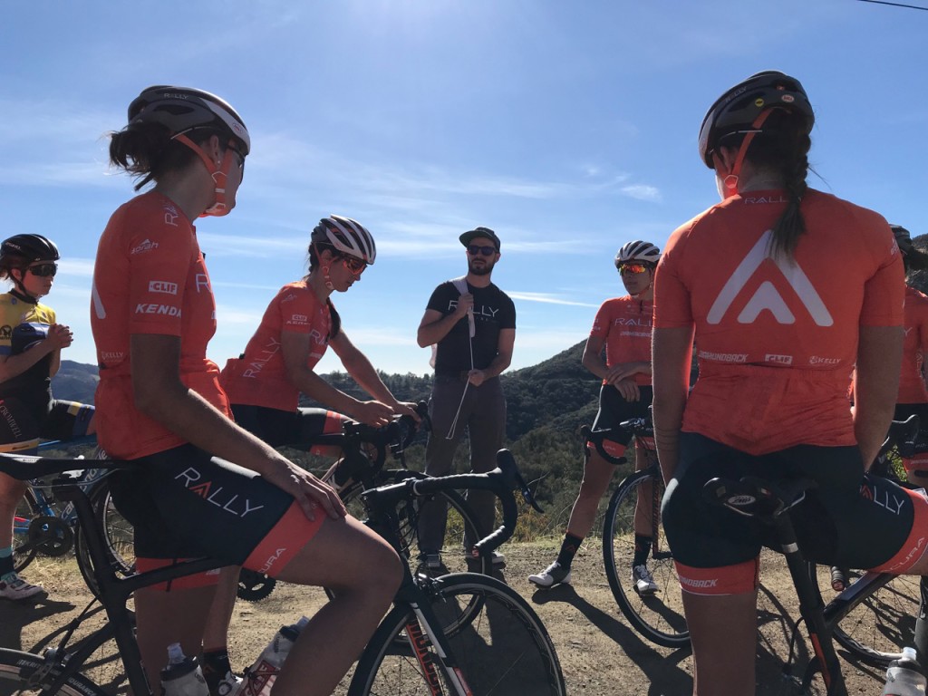 Sport Director Zach Bell Giving Instructions Before a Ride